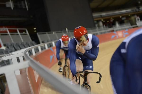 Ed Clancy (Great Britain) follows his team through a training session