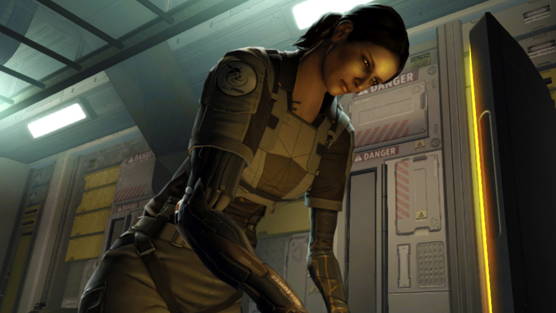 A woman using a computer during the RPG Deus Ex: Human Revolution