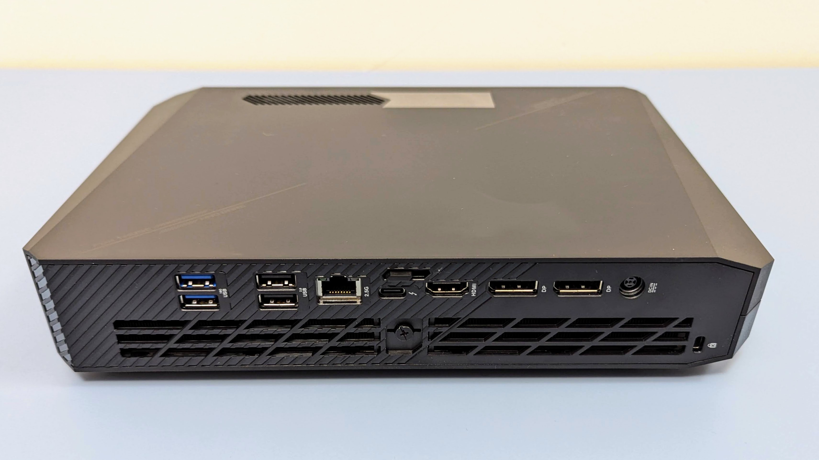 Asus ROG NUC 970 from rear showing ports, including 4x USB, RJ45 Ethernet, USB-C, HDMU and dual displayport.