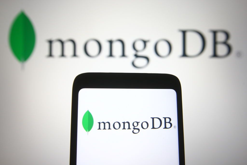 mongoDB logo on smartphone and blurred in background