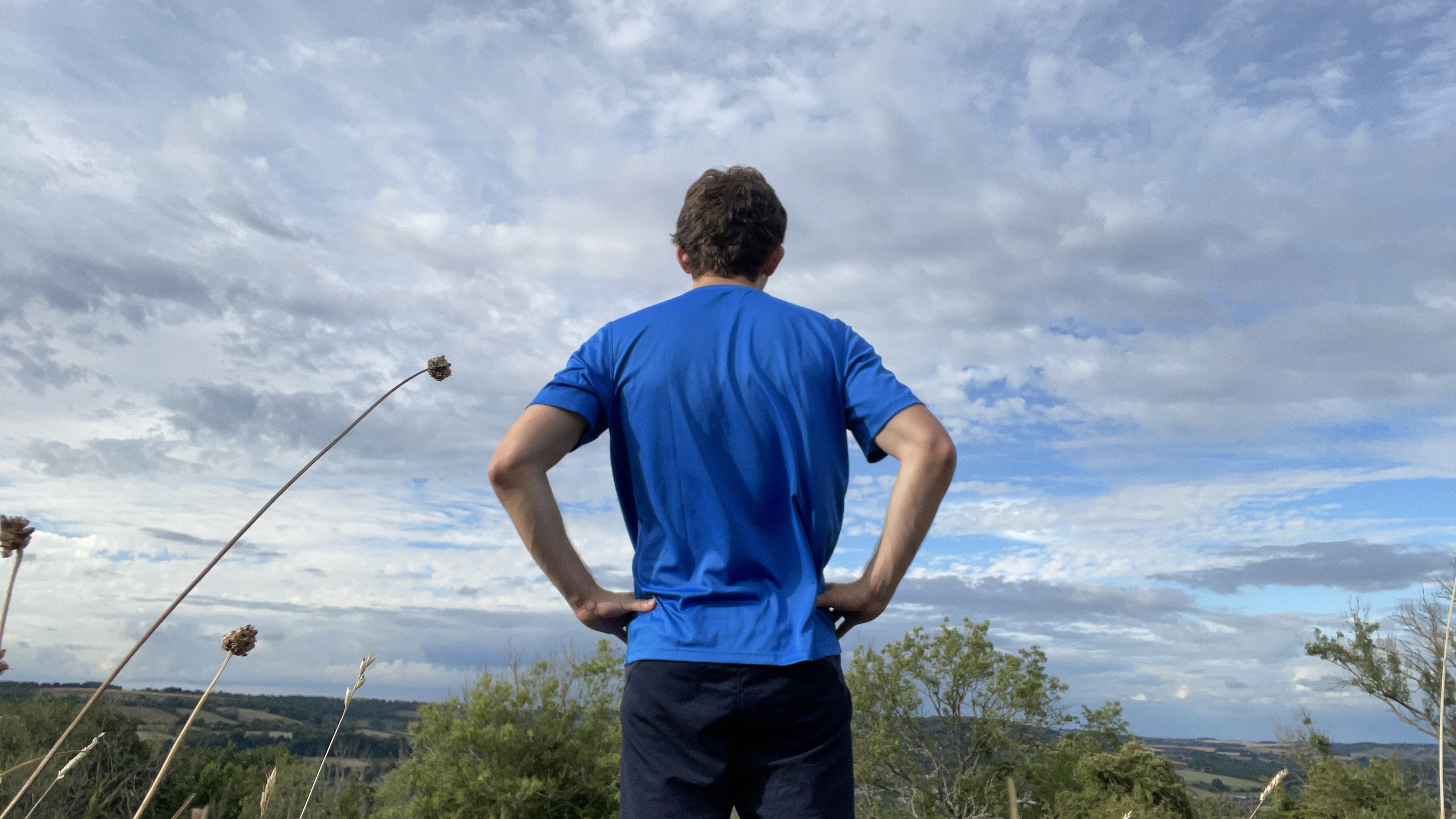 Rear view of a runner wearing the Helly Hansen Tech T-shirt 2.0