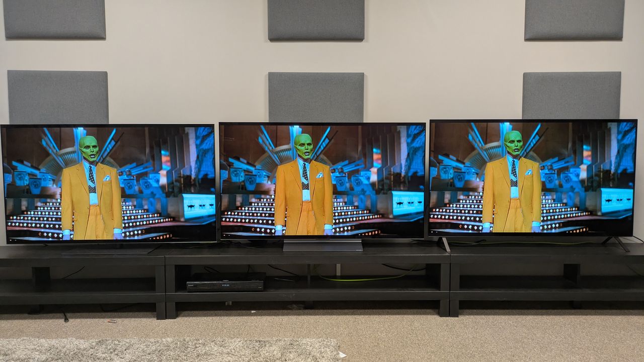 The LG G5 (left), LG C5 (middle) and LG B5 (right) showing The Mask on screen