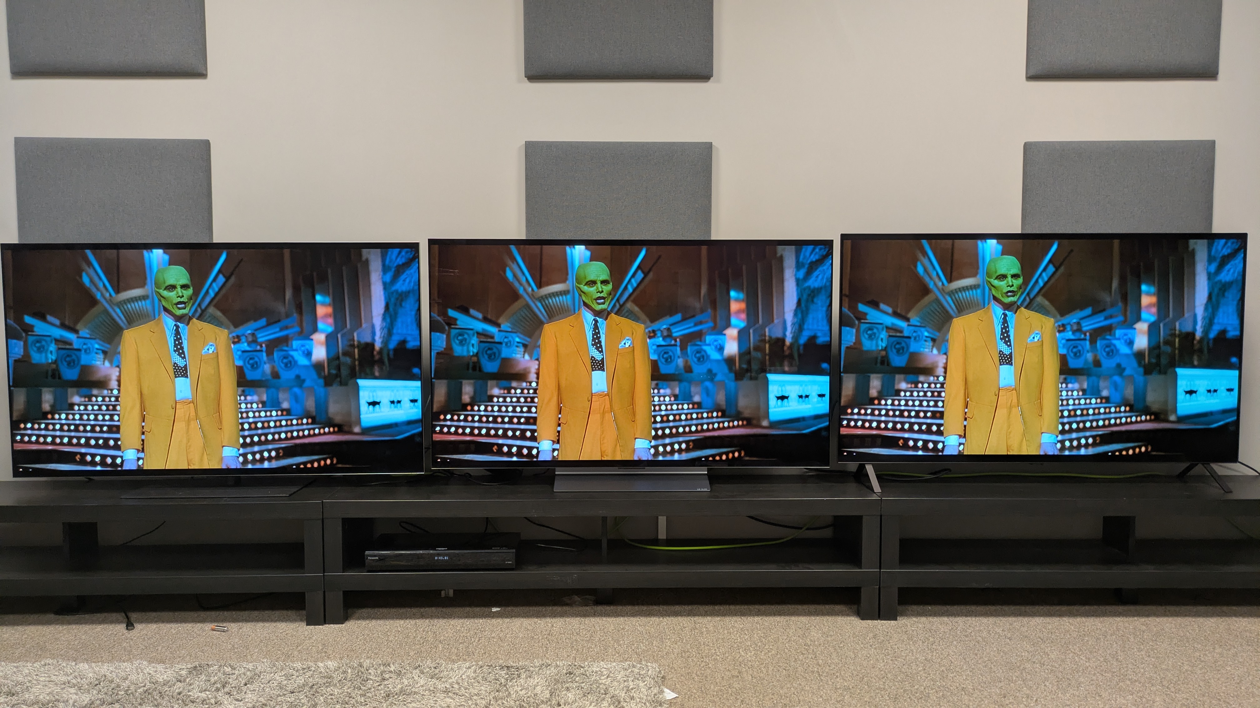 The LG G5 (left), LG C5 (middle) and LG B5 (right) showing The Mask on screen