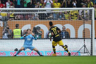 Borussia Dortmund's Pierre-Emerick Aubameyang sees his Panenka penalty saved by Augsburg goalkeeper Marwin Hitz in a Bundesliga game in September 2017.