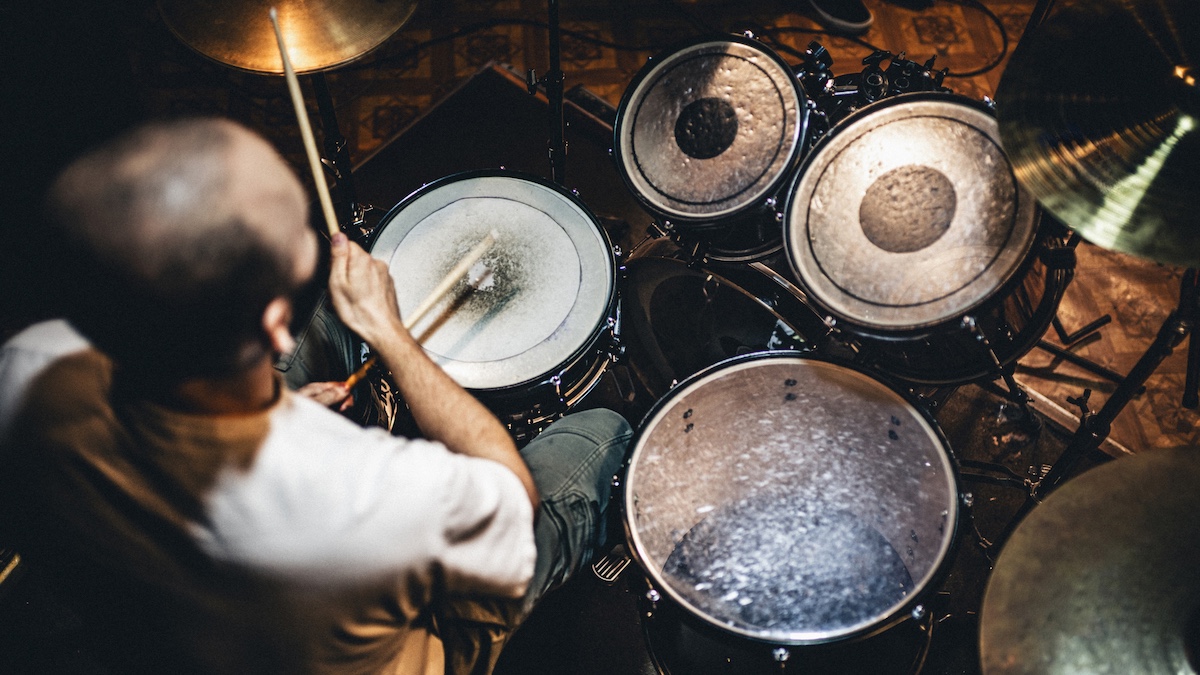 Overhead view of a man playing drums