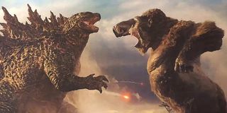 Godzilla and Kong fighting