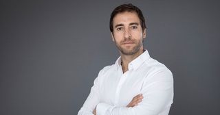 Arsenal old boy, GF Biochemical CEO and former french football player Mathieu Flamini poses during a studio photo shoot in Paris on August 30, 2022.