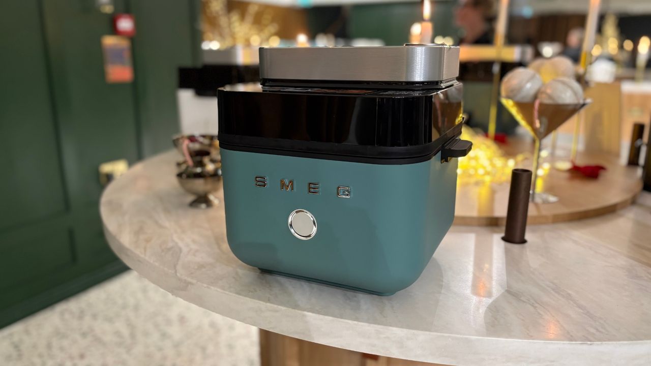 Smeg Air Fryer in green on a table
