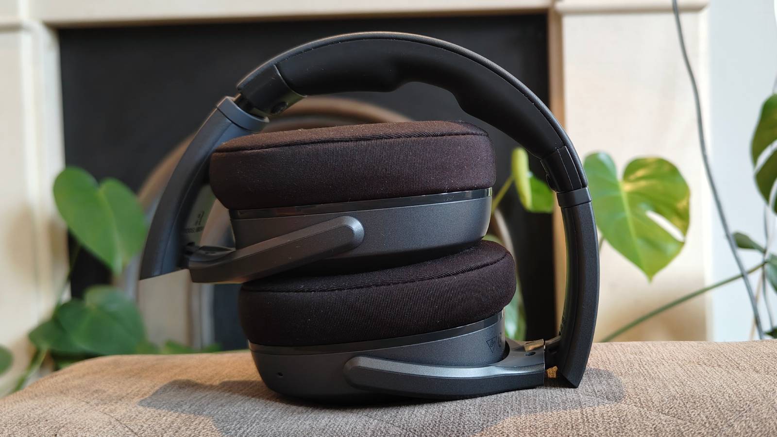 The Skullcandy Crusher 540 Active on a sofa.