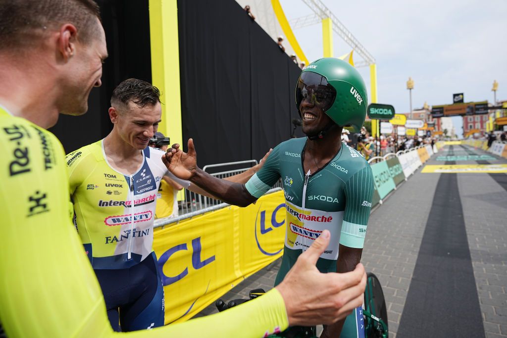 NICE FRANCE JULY 21 LR Hugo Page of France Laurenz Rex of Belgium and Girmay of Eritrea and Team Intermarche Wanty Green Sprint Jersey react after the 111th Tour de France 2024 Stage 21 a 337km individual time trial from Monaco to Nice UCIWT on July 21 2024 in Nice France Photo by Laurent Cipriani PoolGetty Images