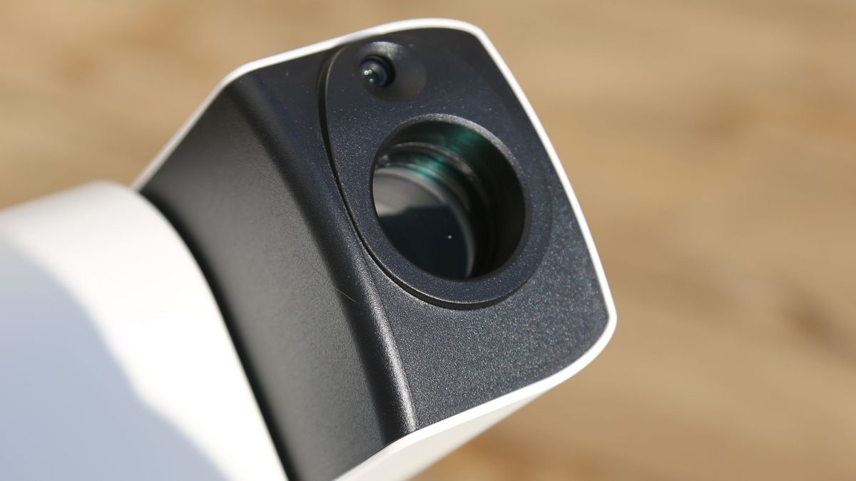 A close-up on the side of the optical tube on the ZWO Seestar S30 Pro pointing upwards.