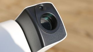 A close-up on the side of the optical tube on the ZWO Seestar S30 Pro pointing upwards.