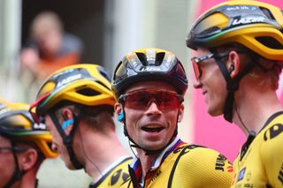 JumboVismas Slovenian rider Primoz Roglic 2ndR speaks with a teammate during the presentation of the teams prior to the twelfth stage of the Giro dItalia 2023 cycling race 179 km between Bra and Rivoli on May 18 2023 Photo by Luca Bettini AFP Photo by LUCA BETTINIAFP via Getty Images