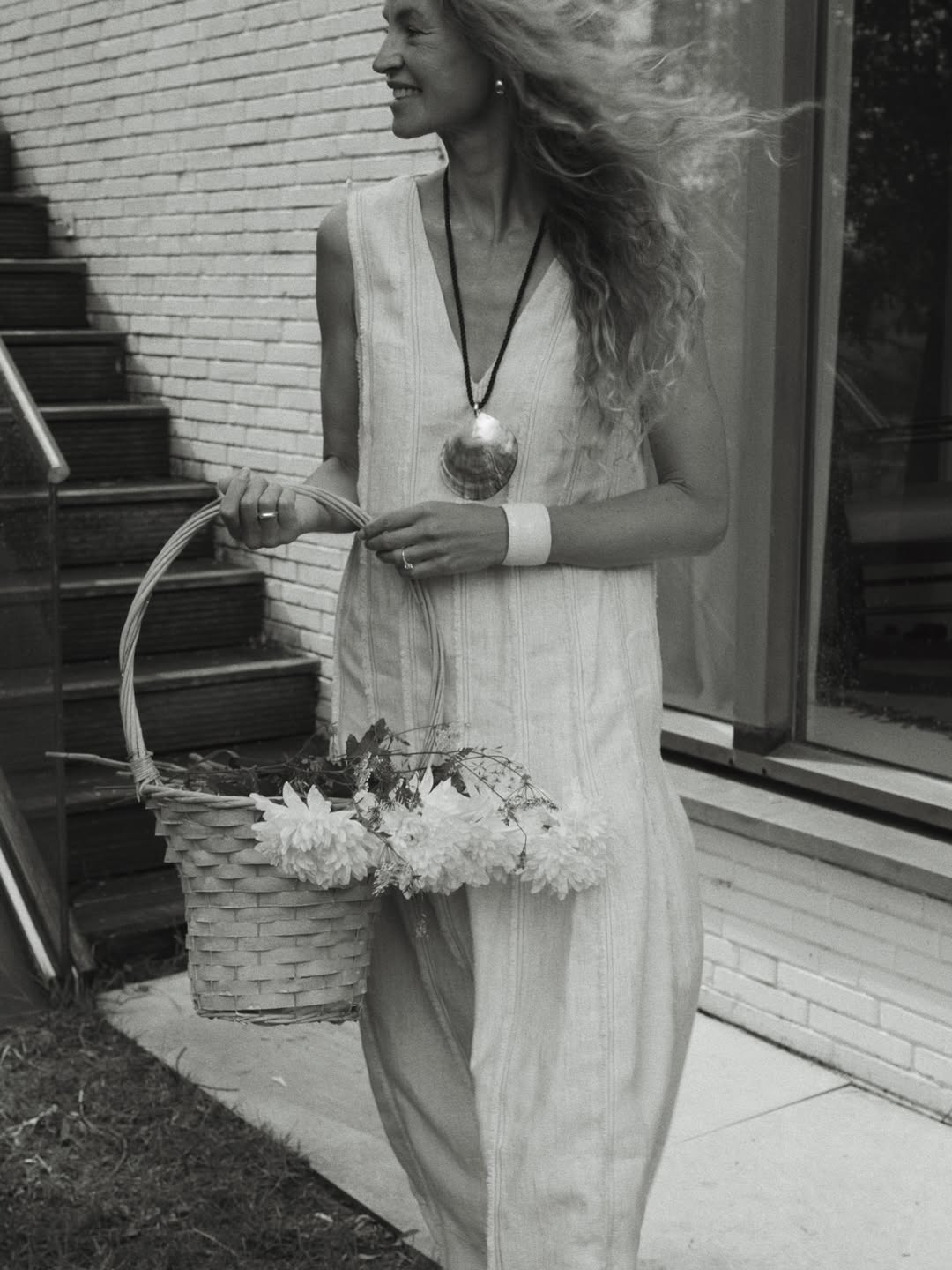Influencer Anouk Yve wearing a white dress.
