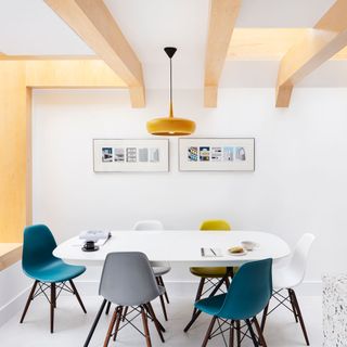 Light and bright kitchen diner with oak beamed ceiling and rooflights