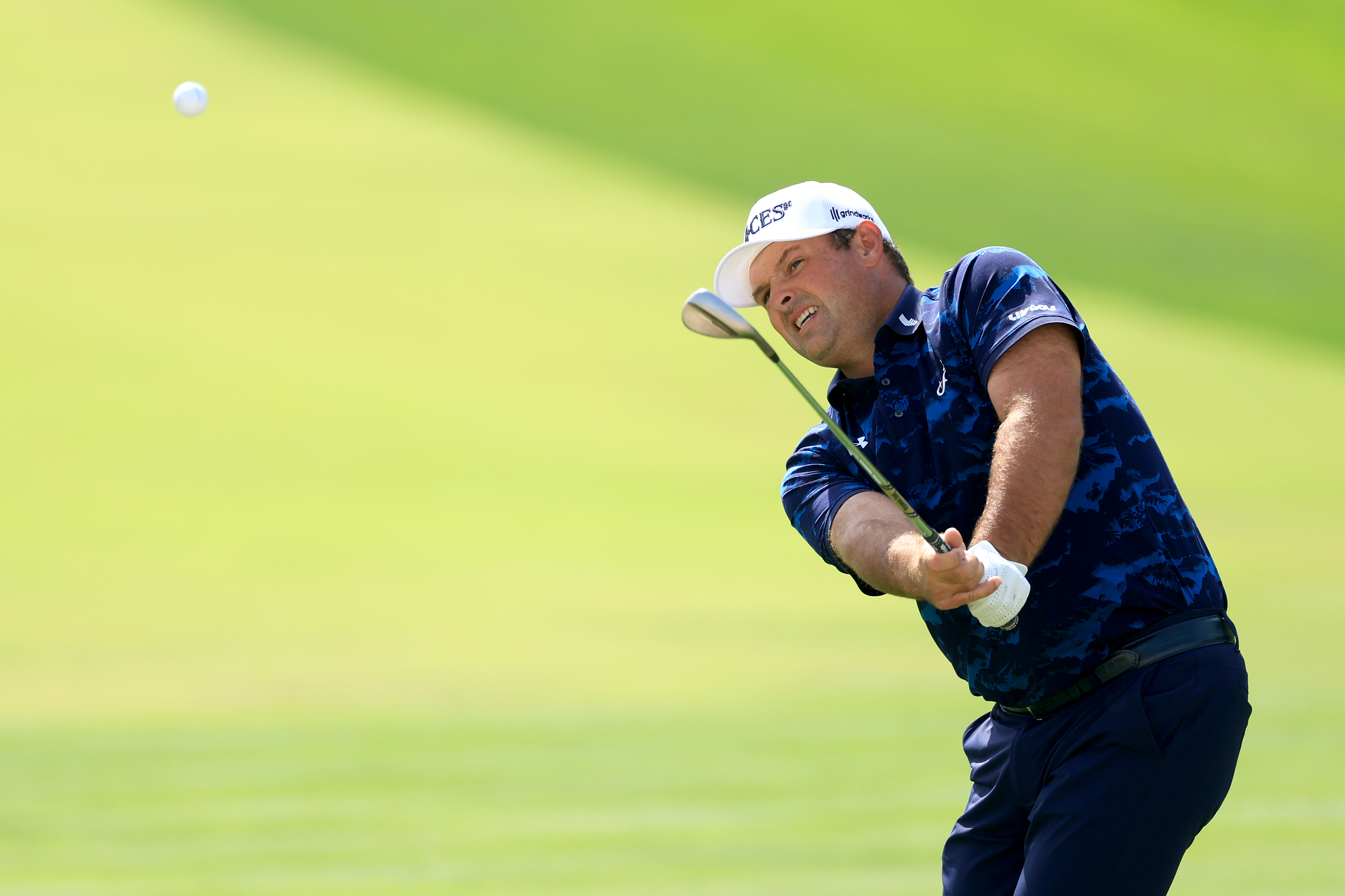 Patrick Reed hits a wedge shot