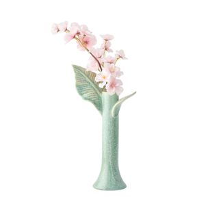 Green leaf vase with pink flowers