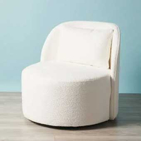 Boucle swivel chair, $399, HomeGoods