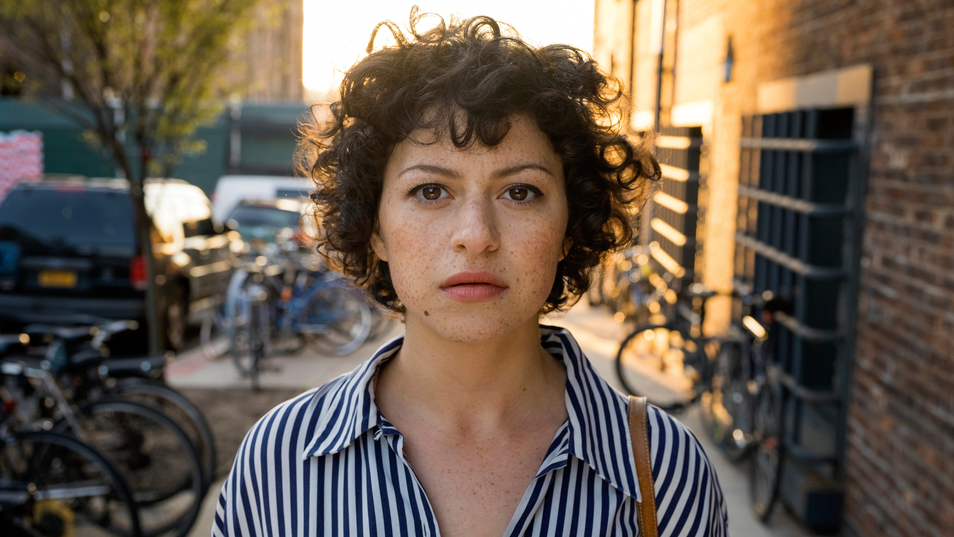 Dory (Alia Shawkat) looks down the lens in a promotional still for HBO Max's "Search Party"