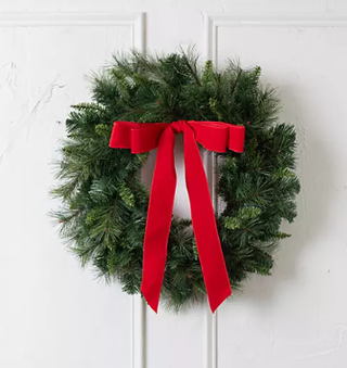 Christmas wreath with red bow.
