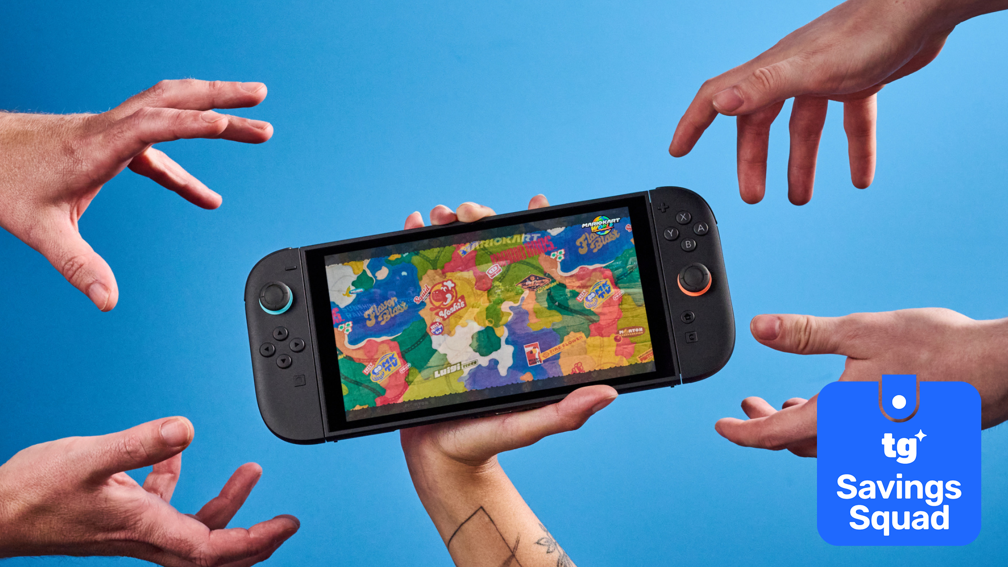 Switch 2 console with four hands trying to grab it