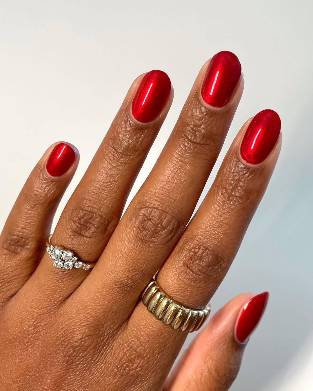 a chrome red manicure
