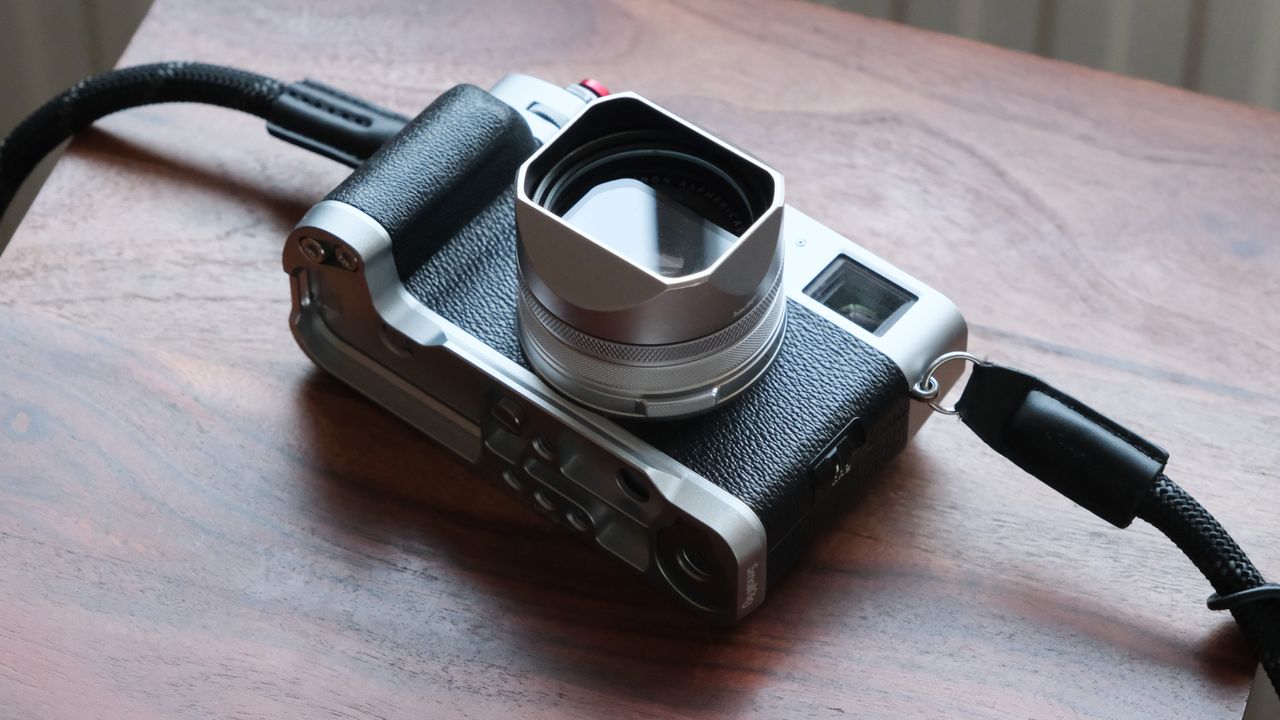 Fujifilm X100VI camera on a wooden table