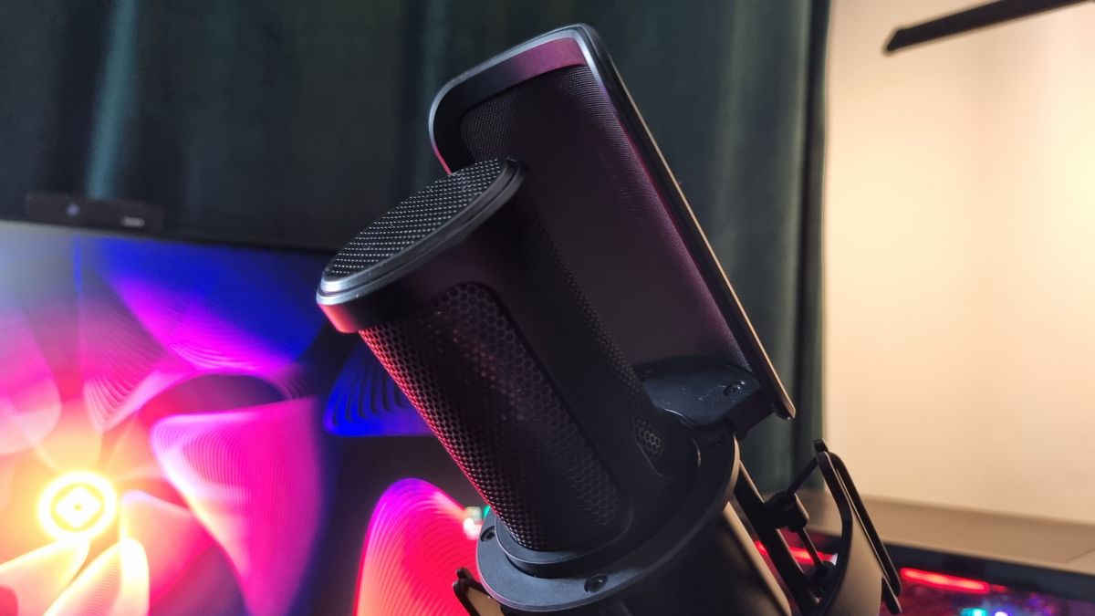The rear of the Shure SM4 microphone, attached to a boom arm