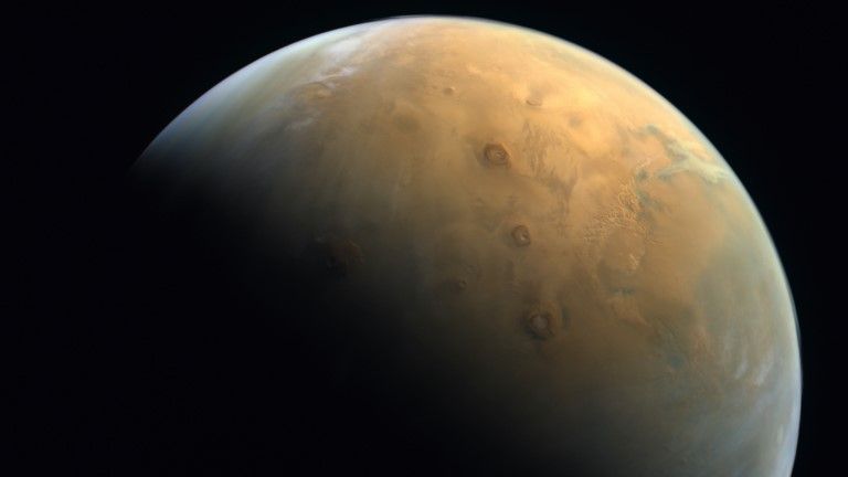 The UAE's Hope spacecraft's first photo of Mars from orbit, captured on Feb. 10, 2021.