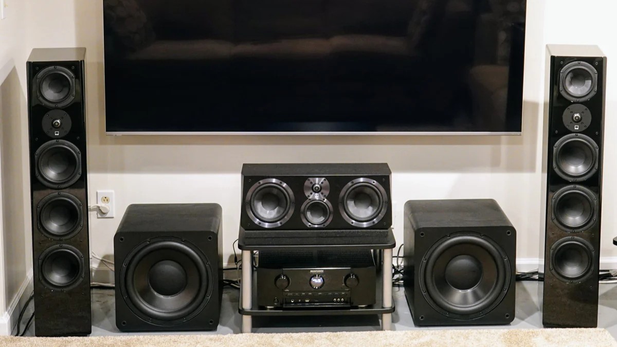 SVS speaker system with two subwoofers and TV in back