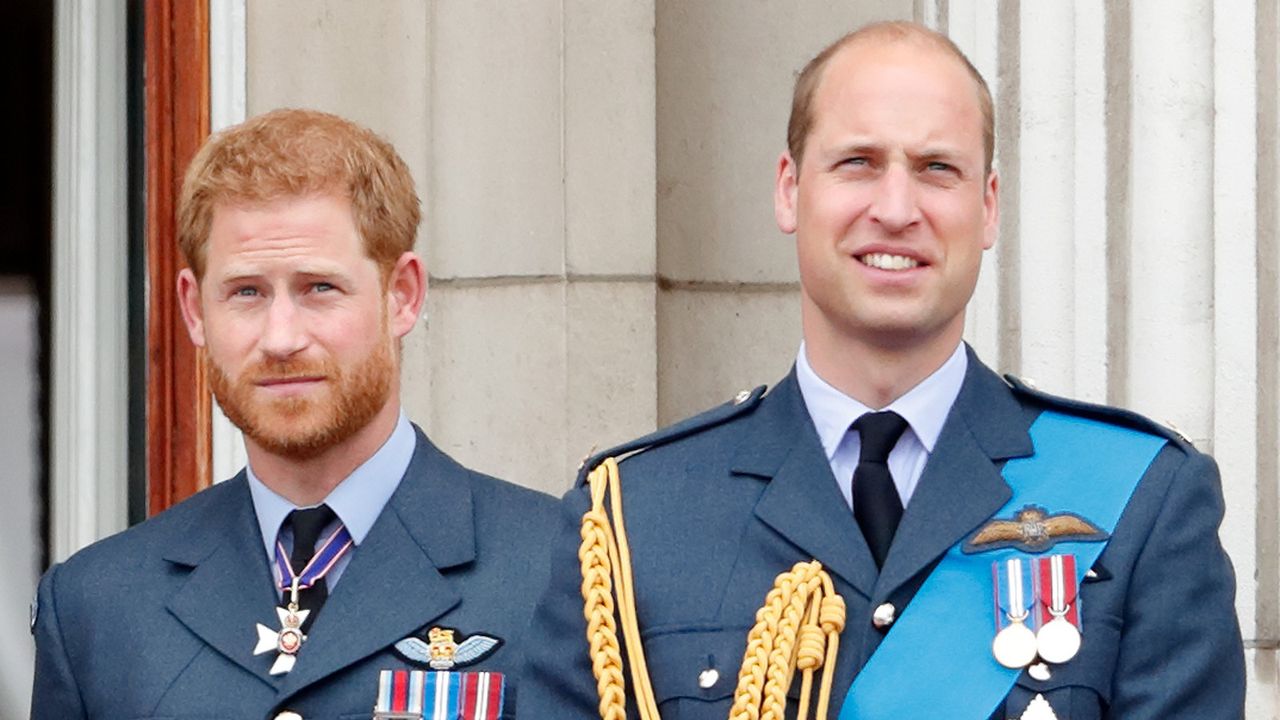 Prince Harry, Duke of Sussex and Prince William, Duke of Cambridge watch a flypast to mark the centenary of the Royal Air Force from the balcony of Buckingham Palace on July 10, 2018 in London, England. The 100th birthday of the RAF, which was founded on on 1 April 1918, was marked with a centenary parade with the presentation of a new Queen&#039;s Colour and flypast of 100 aircraft over Buckingham Palace.