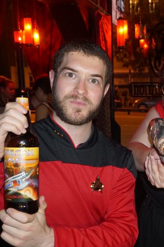 The author poses with Vulcan Ale during a launch party on Oct. 5.