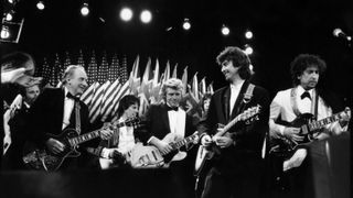 Les Paul With (from left) Jeff Beck, Dave Edmunds, Mick Jagger (partially hidden), George Harrison and Bob Dylan at the Third Annual Rock and Roll Hall of Fame Awards, 1988.