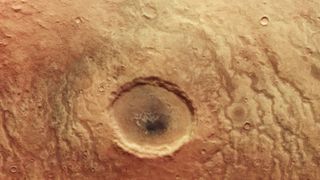 An unusual colorful crater on Mars photographed by Europe's Mars Express probe.