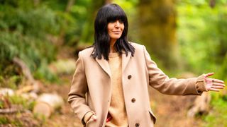 Claudia Winkleman wearing a camel coat on episode 4 of The Traitors