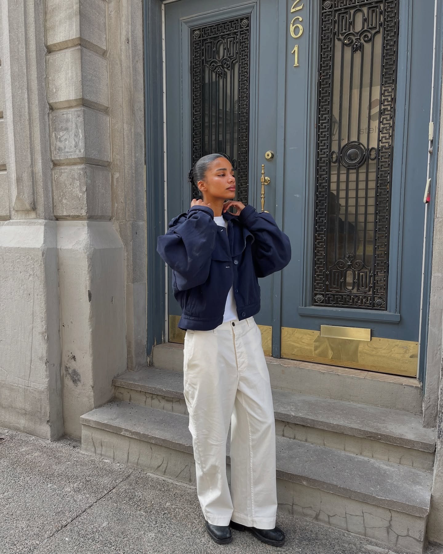 woman wearing chic airport outfit 2025