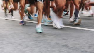 Close-up of runners' feet during a race