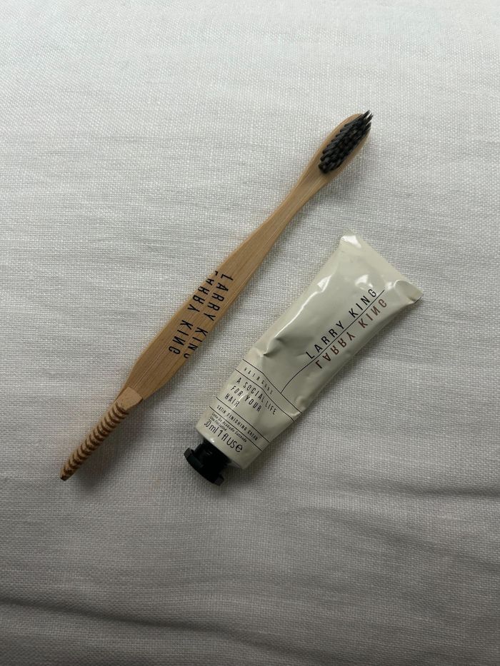 The Larry King Haircare Flyaway With Me Kit on a white linen background