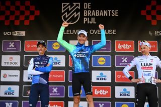 Benoit Cosnefroy on top of the podium at De Brabantse Pijl 2024 alongside Dylan Teuns and Tim Wellens