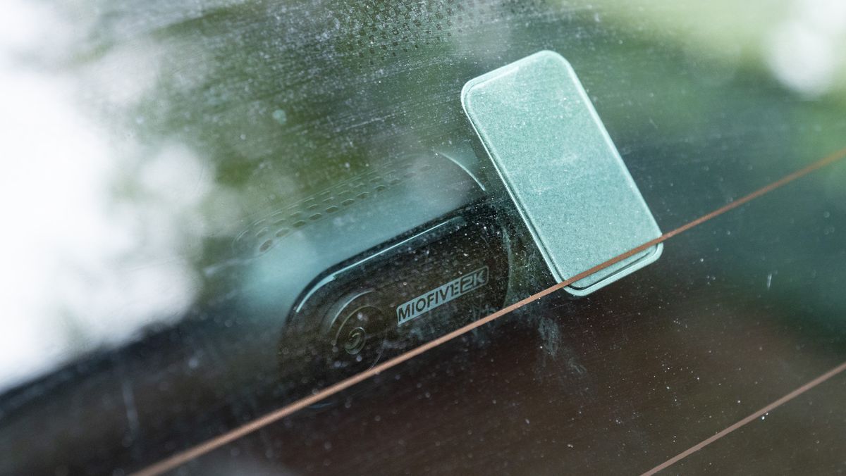 Miofive Dual Dash Cam rear camera attached to windscreen