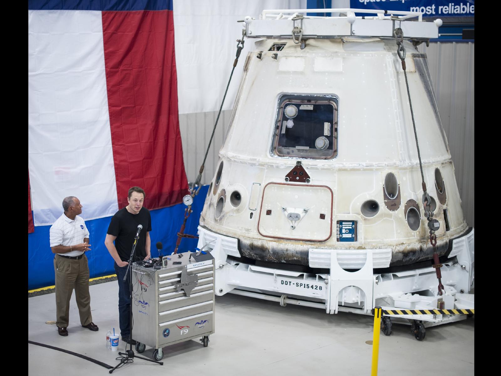 NASA chief Charlie Bolden and SpaceX CEO Elon Musk with the history-making Dragon capsule