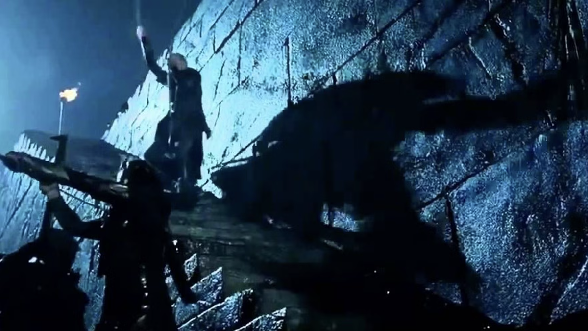Legolas slides on a shield in The Lord of the Rings: The Two Towers
