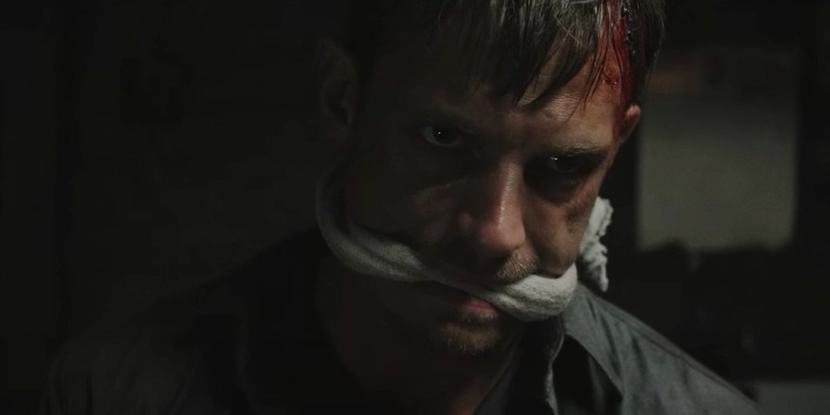 The Secrets We Keep Joel Kinnaman gagged and bloody