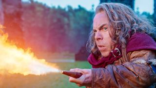 Willow Ufgood (Warwick Davis), shooting fire from a spout in WILLOW