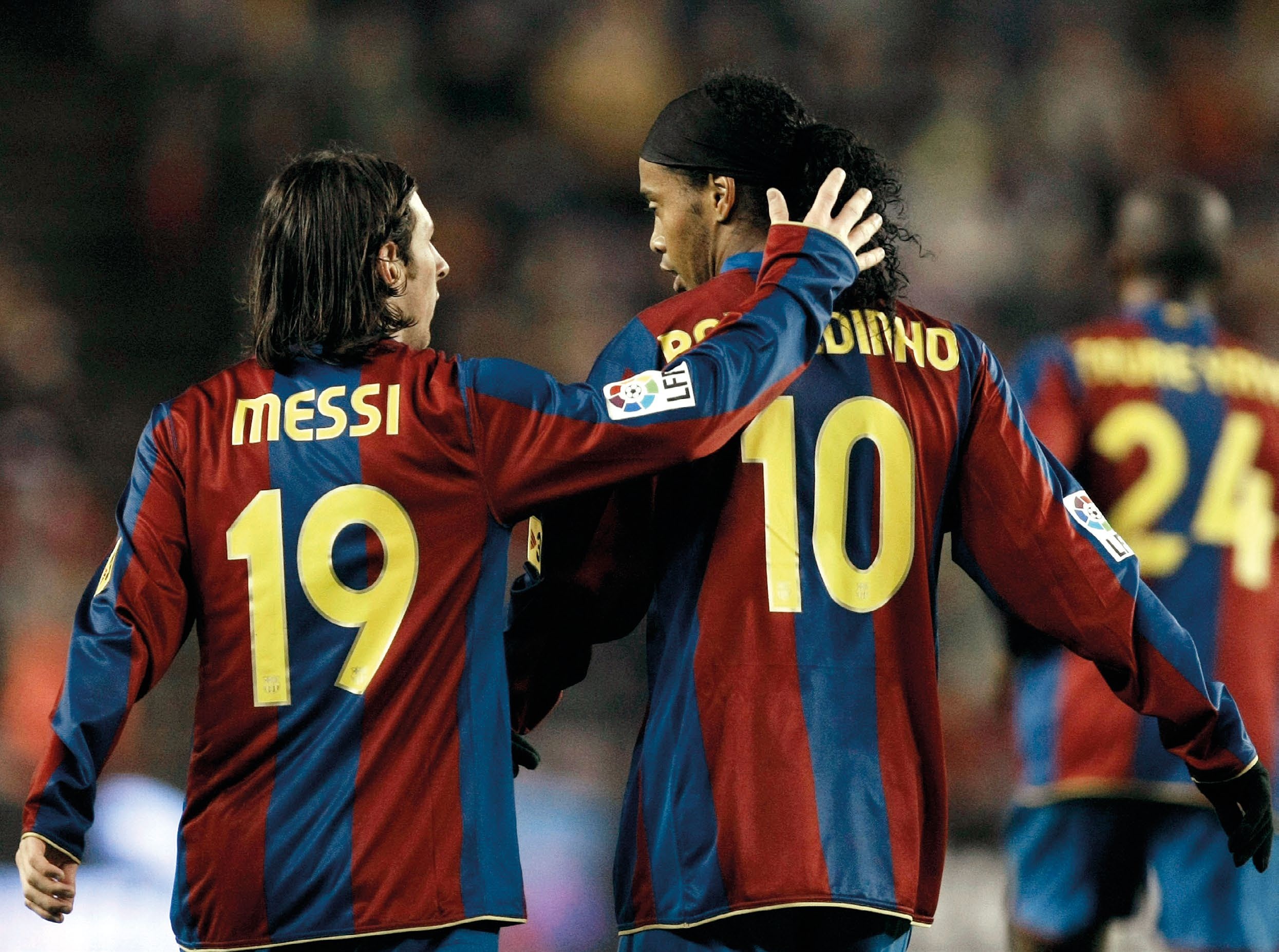 Messi and Ronaldinho celebrate after winning the Spanish league by beating Espanyol at the Camp Nou stadium on 6 May 2006, they defeated Arsenal in the Champions League final 11 days later