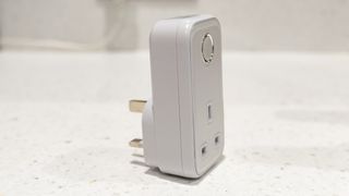 The Hive Active Smart Plug stood upright on a countertop