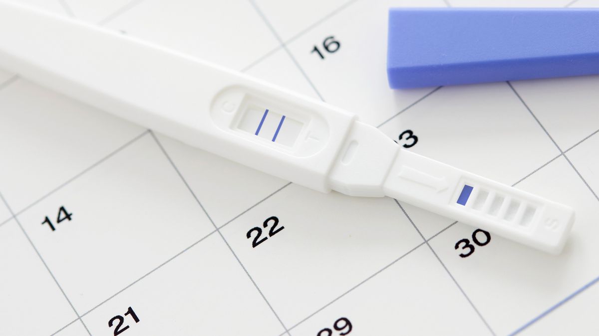 positive pregnancy test on a calendar chart