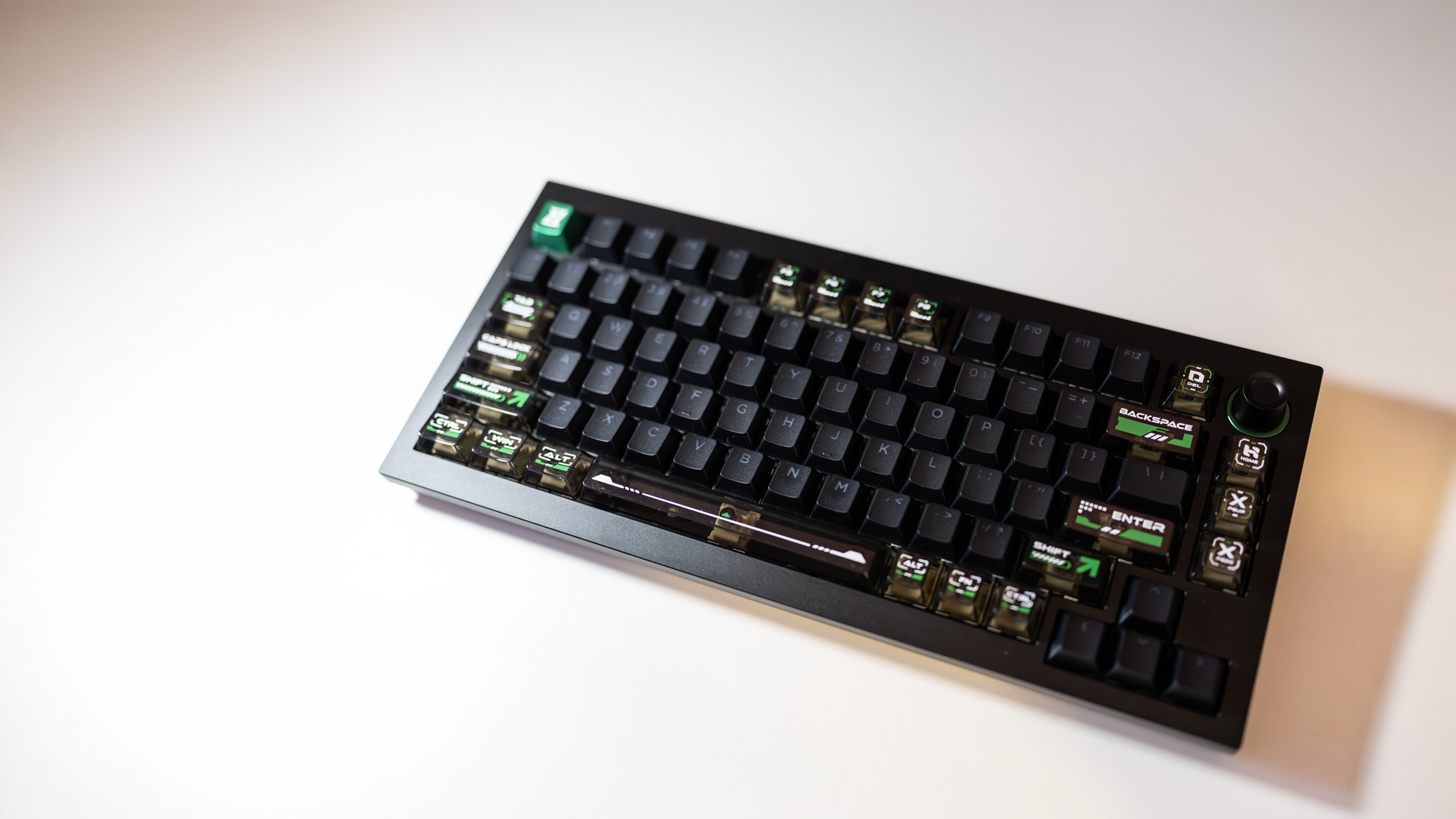 Lemokey L5 HE 8K gaming keyboard with RGB enabled on a desk.