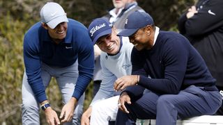 Tiger Woods jokes with Justin Thomas and Rory McIlroy at the genesis Invitational