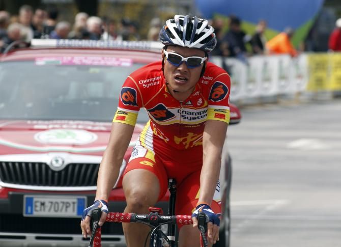 Gang Xu (Champion System) crosses the line in 8th place after spending the day in the breakaway at Trentino